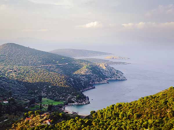 View to the north from Poros island in the Saronic Gulf in Greece. The distant coast vanishes in the clouds.