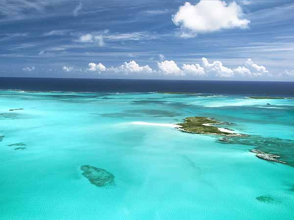 The caribbean ocean, sandbars and islands. An incredible and surreal scene in the beautiful Bahamas.