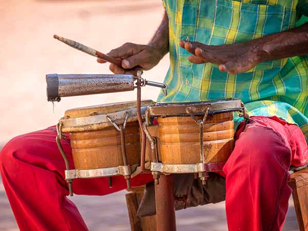Street musician playing drums in Trinidad, Cuba