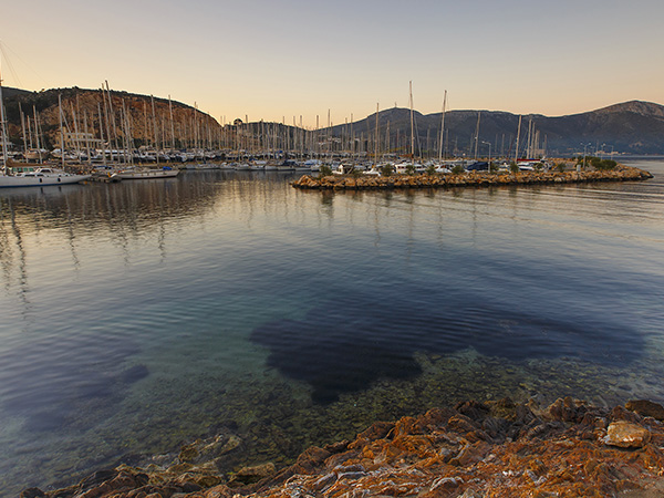 View of a marina in Lakki village on Leros island in Greece early in the morning.