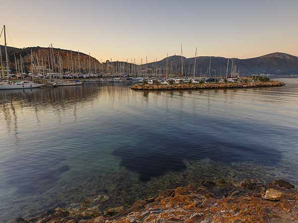 View of a marina in Lakki village on Leros island in Greece early in the morning.