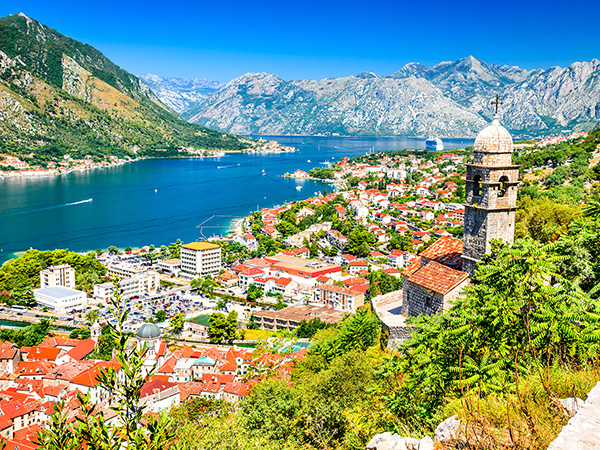 Kotor, Montenegro. Bay of Kotor bay is one of the most beautiful places on Adriatic Sea, it boasts the preserved Venetian fortress, old tiny villages, medieval towns and scenic mountains.