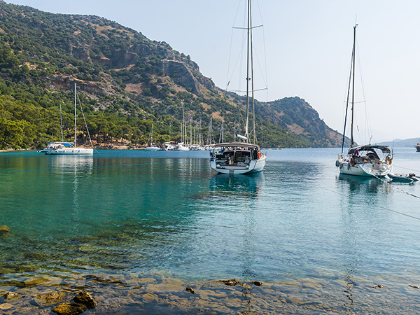 Sailing yachts anchorage at beautiful calm bay