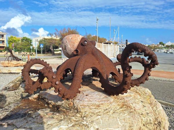 Iron Statue of an Octopus in a harbour in Palma de Mallorca