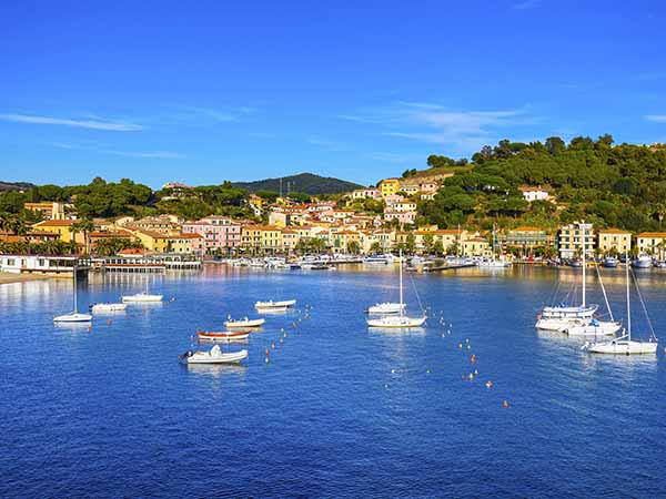 Elba island, Porto Azzurro village bay and marina view. Tuscany, Italy, Europe